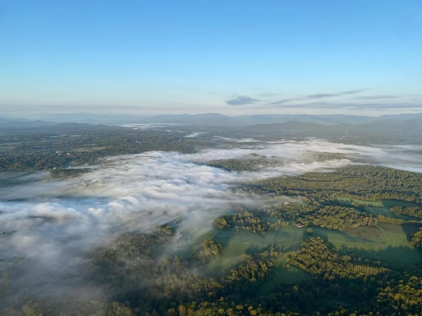View from balloon above the morning clouds over Virginia countryside